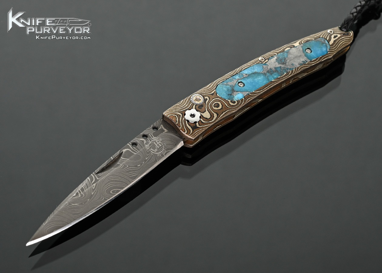 William Henry Custom Knife "Cave Creek" Damascus and Raindrop Mokume with Zinc Matrix Turquoise Interframe Button Lock 18480
