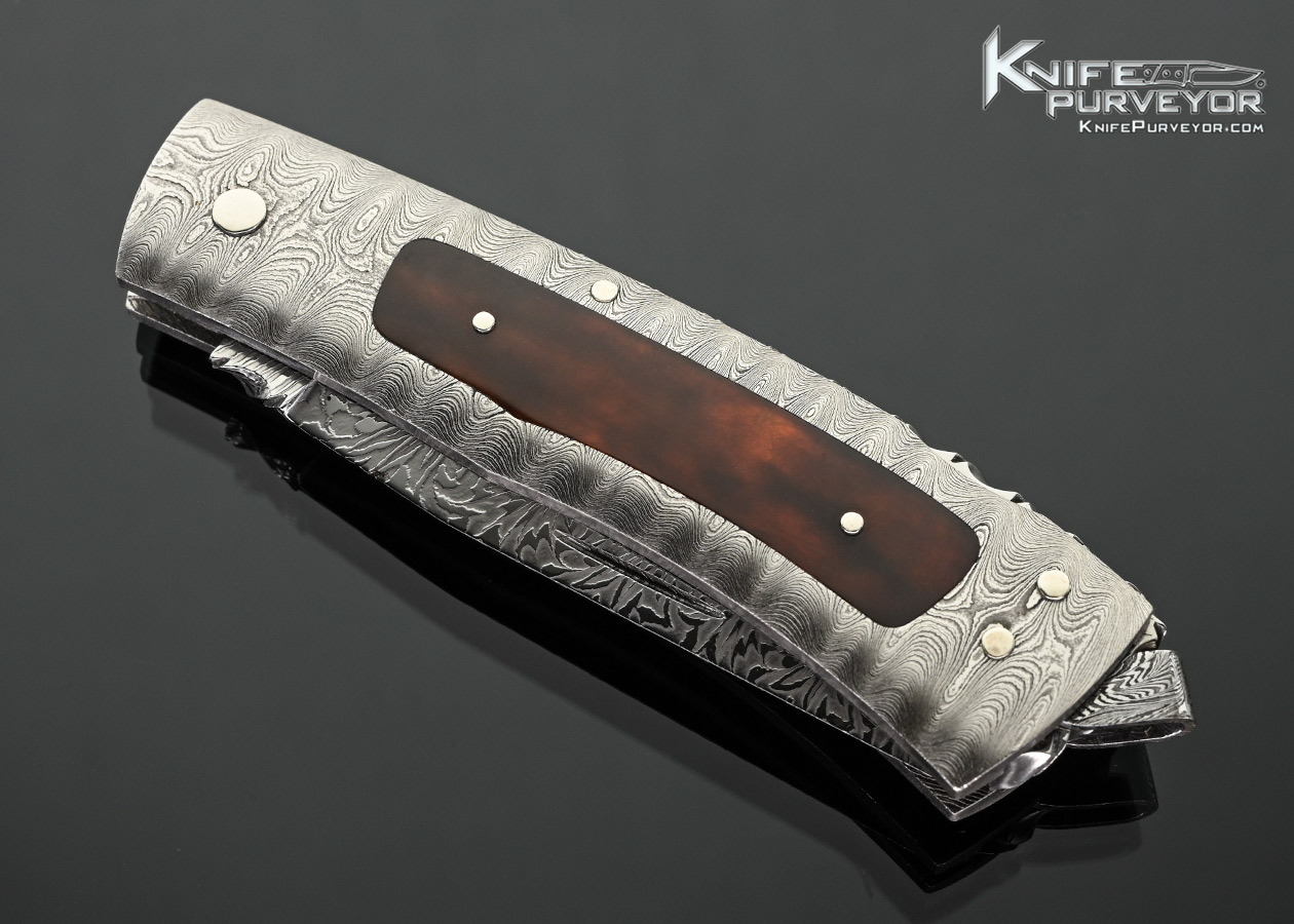 Kay Embresten Custom Knife Sole Authorship Explosion Damascus and Amber Interframe Lockback - Image 2