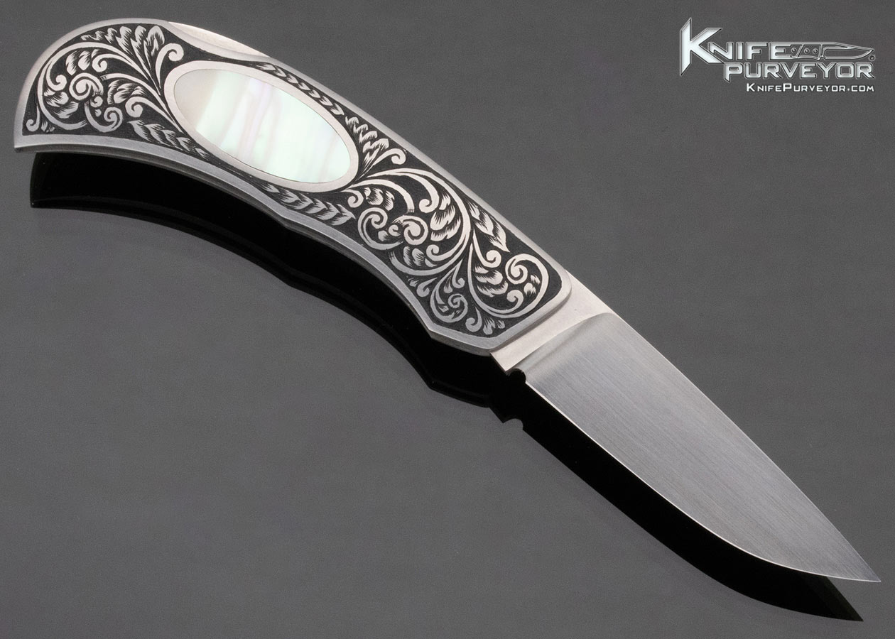 Jack Busfield Custom Knife KWW Engraved Green Sea Snail Interframe Lockback - Image 3