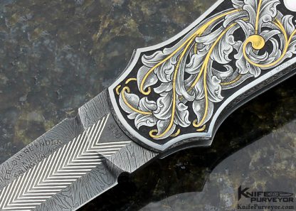 Tom Overeynder Custom Knife Mother of Pearl Shell Semi Interframe Lockback Dagger with Owen Wood "Chevron & Flame" Damascus Loclback Dagger Engraved by Joe Mason - Image 2