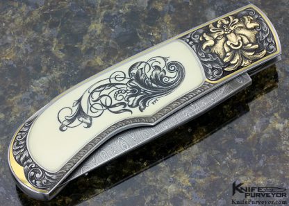 Steve Hoel Custom Knife Scrimshawed Mammoth Interframe Lockback Engraved with Sculpted Built Up 24Kt Gold by Franz Marktl - Image 4