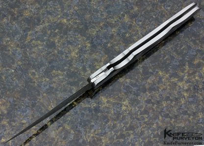 Joe Kious Custom Knife Black Lip Tahitian Pearl Shell Double Interframe Lockback Wharncliff with Mike Norris Stainless Damascus - Image 4