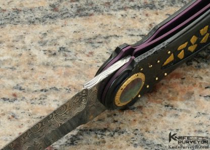 Howard Hitchmough Custom Knife Textured Blued Steel with Gold Nugget Inlays, Damasteel Damascus Dagger with Gold Bale and Pearl Inlaid Gold Pivot Linerlock - Image 7