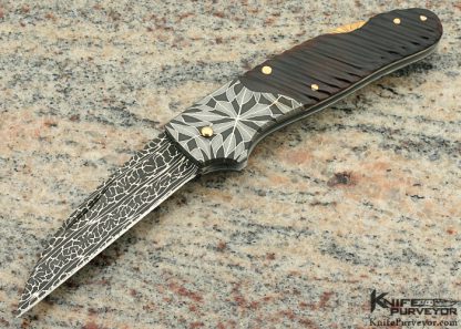 Joe Kious Custom Knife Fluted Exoctic Material and Damascus Wharncliff Lockback