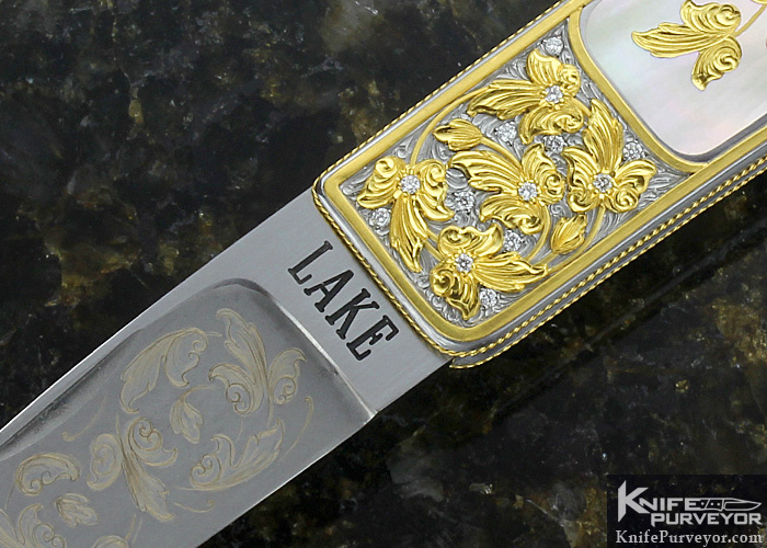 Ron Lake Custom Knife Black Lip Tahitian Pearl Interframe Tail Lock Engraved by Barry Lee Hands - Image 2