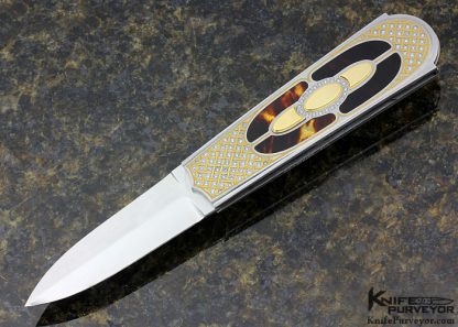 Antonio Fogarizzu Custom Knife Exotic Material & 18Kt Gold Inlay Prototype Auto Lockback with 3 Carats of Pave' Set Diamonds and 24Kt Gold Beaded Inlaid