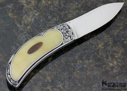 Steve Hoel Custom Knife Ram's Horn with Black Buffalo Horn Escutcheon Interframe Lockback Engraved by Bruce Christensen - Image 3