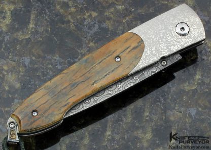 William Henry Custom Knife A.G. Russell Exclusive Mammoth Bark, Stippled Titanium and Mike Norris Raindrop Damascus with Sapphires Button Lock - Image 4