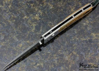 William Henry Custom Knife A.G. Russell Exclusive Mammoth Bark, Stippled Titanium and Mike Norris Raindrop Damascus with Sapphires Button Lock - Image 5