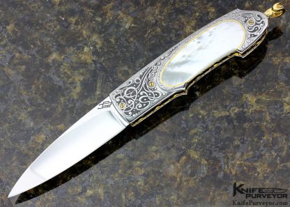 Salvatore Puddu Custom Knife "Duca" Engraved by Gianni Abraini Mother of Pearl Shell with Diamonds and Gold Inlays Lockback