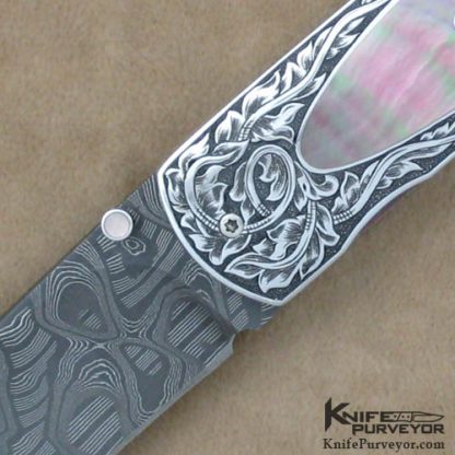 Andre van Heerden Custom Knife Blacklip Pearl Interframe Linerlock Engraved by Helen van Wyck - Image 2