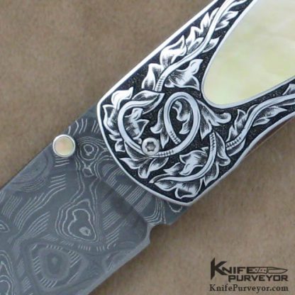 Andre van Heerden Custom Knife Goldlip Pearl Interframe Linerlock Engraved by Helen van Wyck - Image 2