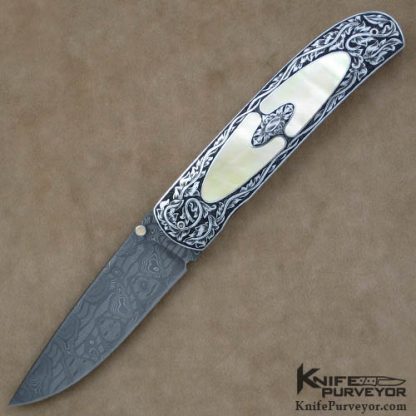 Andre van Heerden Custom Knife Goldlip Pearl Interframe Linerlock Engraved by Helen van Wyck