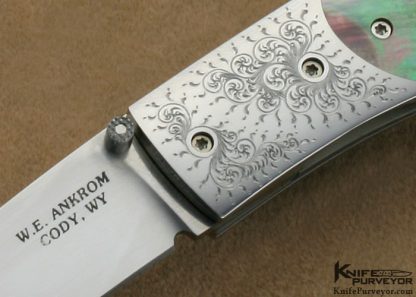 Bill Ankrom Custom Knife Simon Lytton Engraved Black Lip Tahitian Pearl Shell with South Sea Gold Lip Pearl Escutcheon Linerlock - Image 2