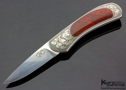 Steve Hoel Custom Knife Small Drop Point Lockback Engraved by Daniele Pozzi Interframe with Fossil Dinosaur Bone