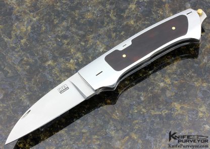 Dietmar Kressler Custom Knife Amber Interframe Tail Lock
