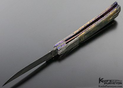 Don Hanson Custom Knife Fluted Mammoth & Sole Authorship Damascus Linerlock with Fileworked 14 Kt Gold Inlaid Spine - Image 7