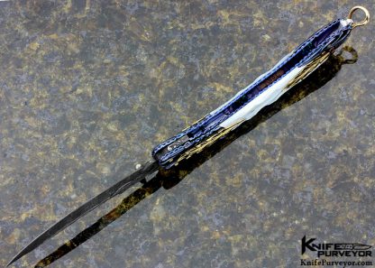 Donald Vogt Custom Knife  Carved Blued Devin Thomas Damascus Encrusted with Rubies, Carved Mother of Pearl - Image 5