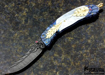 Donald Vogt Custom Knife Carved Blued Devin Thomas Damascus Encrusted with Rubies, Carved Mother of Pearl Shell and Carved 14Kt Gold Accented Linerlock 11934