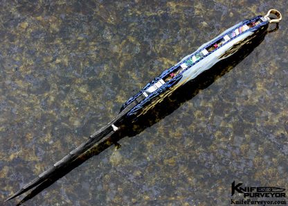 Donald Vogt Custom Knife  Carved Blued Devin Thomas Damascus Encrusted with Rubies, Carved Mother of Pearl - Image 4