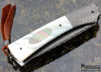 Jerry Rados Custom Knife Sole Authorship "Turkish Twist" Damascus Mother of Pearl Shell with Black Lip Pearl Escutcheon (Left Handed) Scale Release Automatic - Image 3