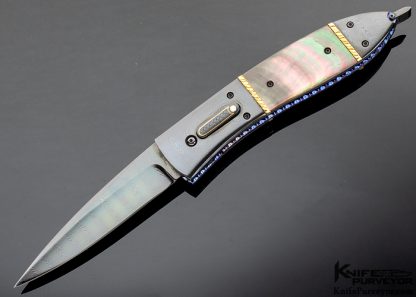 Jim Minnick Custom Knife Blued Damascus Automatic with Black Lip Pearl and Filed Gold