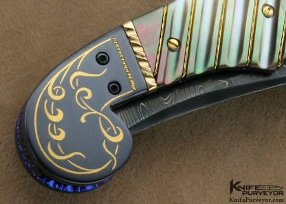 Jim and Joyce Minnick Custom Knife Blued Damascus with 24Kt Gold Inlaid Blued Steel Bolsters and Fluted Black Lip Tahitian Pearl Shell Persian Linerlock - Image 4