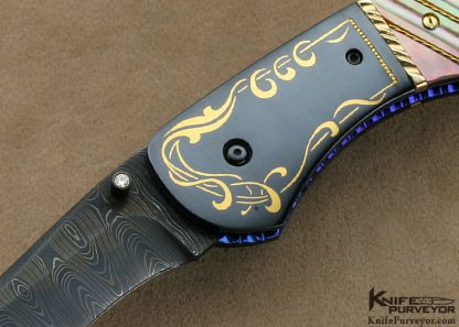 Jim and Joyce Minnick Custom Knife Blued Damascus with 24Kt Gold Inlaid Blued Steel Bolsters and Fluted Black Lip Tahitian Pearl Shell Persian Linerlock - Image 2