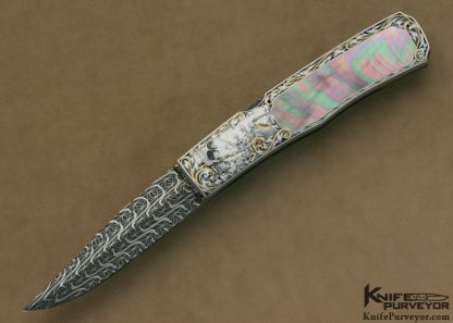 Joe Kious Custom Knife Damascus & Black Lip Tahitian Pearl Shell Interframe Automatic Lockback Engraved by Ray Cover Jr.  "Jason & The Argonauts"