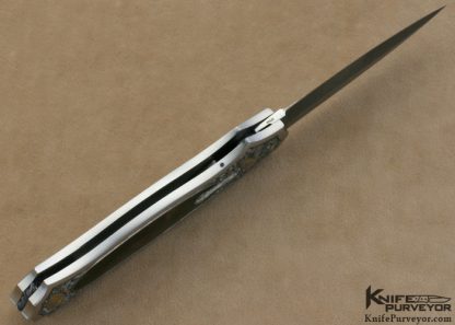 Joe Kious Custom Knife Rick Eaton Engraved Exotic Material Interframe Lockback Dagger with Mike Norris Stainless Steel Damasus Blade - Image 11