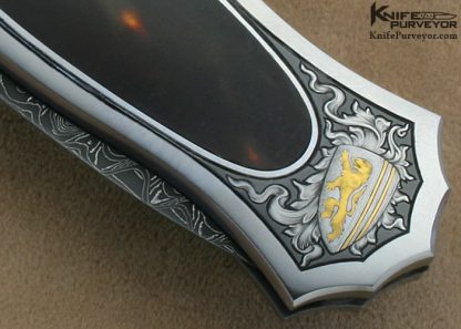 Joe Kious Custom Knife Rick Eaton Engraved Exotic Material Interframe Lockback Dagger with Mike Norris Stainless Steel Damasus Blade - Image 8