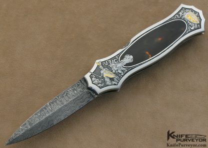 Joe Kious Custom Knife Rick Eaton Engraved Exotic Material Interframe Lockback Dagger with Mike Norris Stainless Steel Damasus Blade