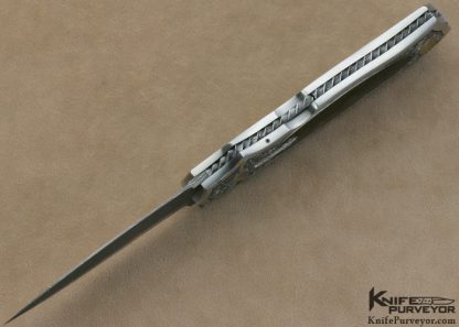 Joe Kious Custom Knife Rick Eaton Engraved Exotic Material Interframe Lockback Dagger with Mike Norris Stainless Steel Damasus Blade - Image 9