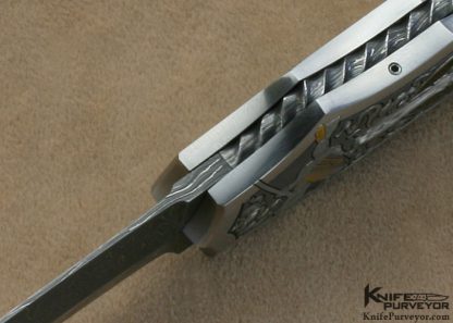 Joe Kious Custom Knife Rick Eaton Engraved Exotic Material Interframe Lockback Dagger with Mike Norris Stainless Steel Damasus Blade - Image 10