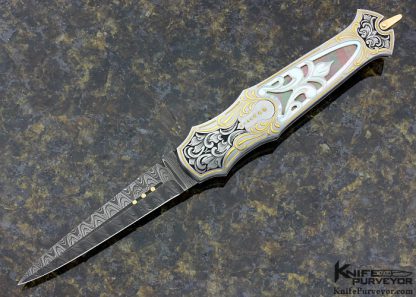 Warren Osborne Custom Knife Carved Mother of Pearl Over Black Lip Tahitian Pearl Automatic Lockback Dagger Engraved by Julie Warenski