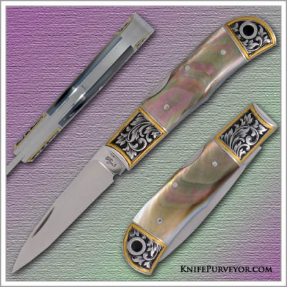 Ryuichi Kawamura's Custom Knife: Blacklip Pearl Lockback Engraved by Jon Robyn. August 31 2007