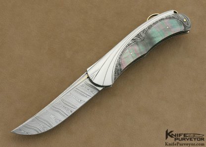 Ken Steigerwalt Custom Knife Fluted Stainless Steel and Damascus with Black Lip Tahitian Pearl Shell Lockback
