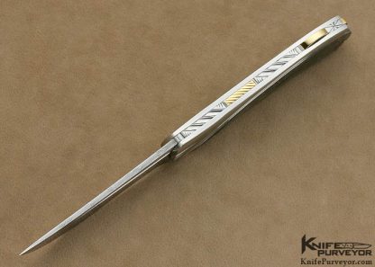 Ken Steigerwalt Custom Knife Fluted Stainless Steel and Damascus with Black Lip Tahitian Pearl Shell Lockback - Image 4