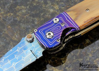 Larry Chew Custom Knife "Fancy Covert" with Robert Eggerling Blued Barb Wire/Jellyroll Mosaic Damascus with Mastodon Scales, Double Thumb Stud Hidden Auto Button Release - Image 2