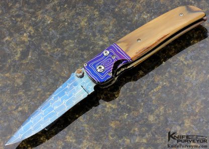 Larry Chew Custom Knife "Fancy Covert" with Robert Eggerling Blued Barb Wire/Jellyroll Mosaic Damascus with Mastodon Scales, Double Thumb Stud Hidden Auto Button Release
