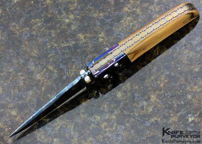 Larry Chew Custom Knife "Fancy Covert" with Robert Eggerling Blued Barb Wire/Jellyroll Mosaic Damascus with Mastodon Scales, Double Thumb Stud Hidden Auto Button Release - Image 4