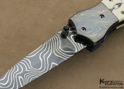 Nate Clark Custom Knife Blued Damascus Button Release Mammoth Ivory Linerlock Dagger Scrimmed by Ron Luebke Jr. - Image 2