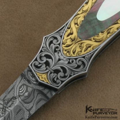 Warren Osborne Custom Knives Brian Hochstrat Engraved Mother of Pearl & Blacklip Pearl Double Interframe Lockback Dagger with a Mike Norris Stainless Damascus Blade - Image 2
