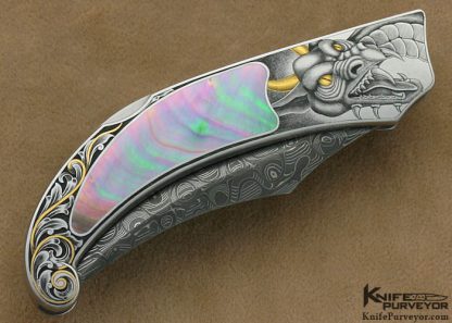 Warren Osborne Custom Knives Ray Cover Jr. Engraved Black Lip Tahitian Pearl Shell Interframe Lockback Lever Release - Image 4