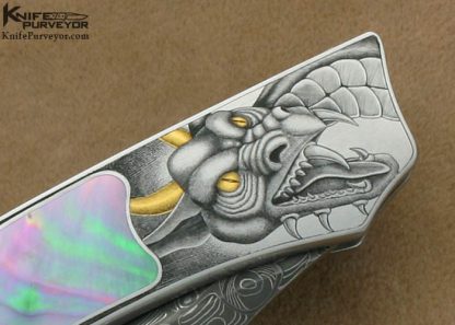 Warren Osborne Custom Knives Ray Cover Jr. Engraved Black Lip Tahitian Pearl Shell Interframe Lockback Lever Release - Image 5
