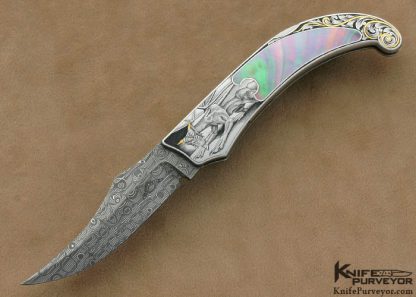 Warren Osborne Custom Knives Ray Cover Jr. Engraved Black Lip Tahitian Pearl Shell Interframe Lockback Lever Release