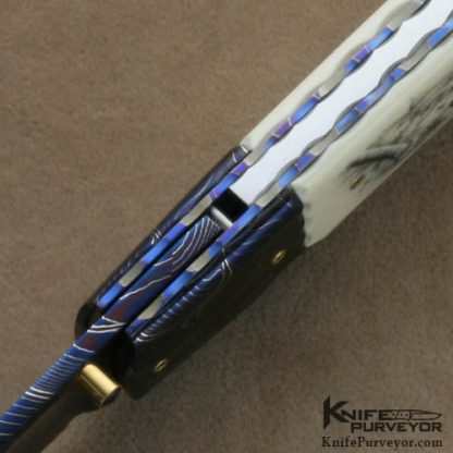 Francesco Pachi Custom Knives Mirella Pachi Scrimshawed Antique Elephant Ivory and Blued Sole Authorhsip Damascus Linerlock - Image 7