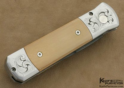 Protech Custom Knife Mastodon & Chad Nichols Damascus Button Release "Godson" Engraved by Tira Mitchell - Image 3