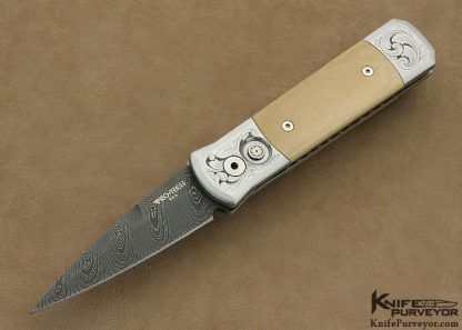 Protech Custom Knife Mastodon & Chad Nichols Damascus Button Release "Godson" Engraved by Tira Mitchell