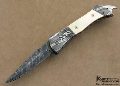 Ralph Selvideo's Custom Knife: Automatic Rattler with Damascus and Goldlip Pearl Shell